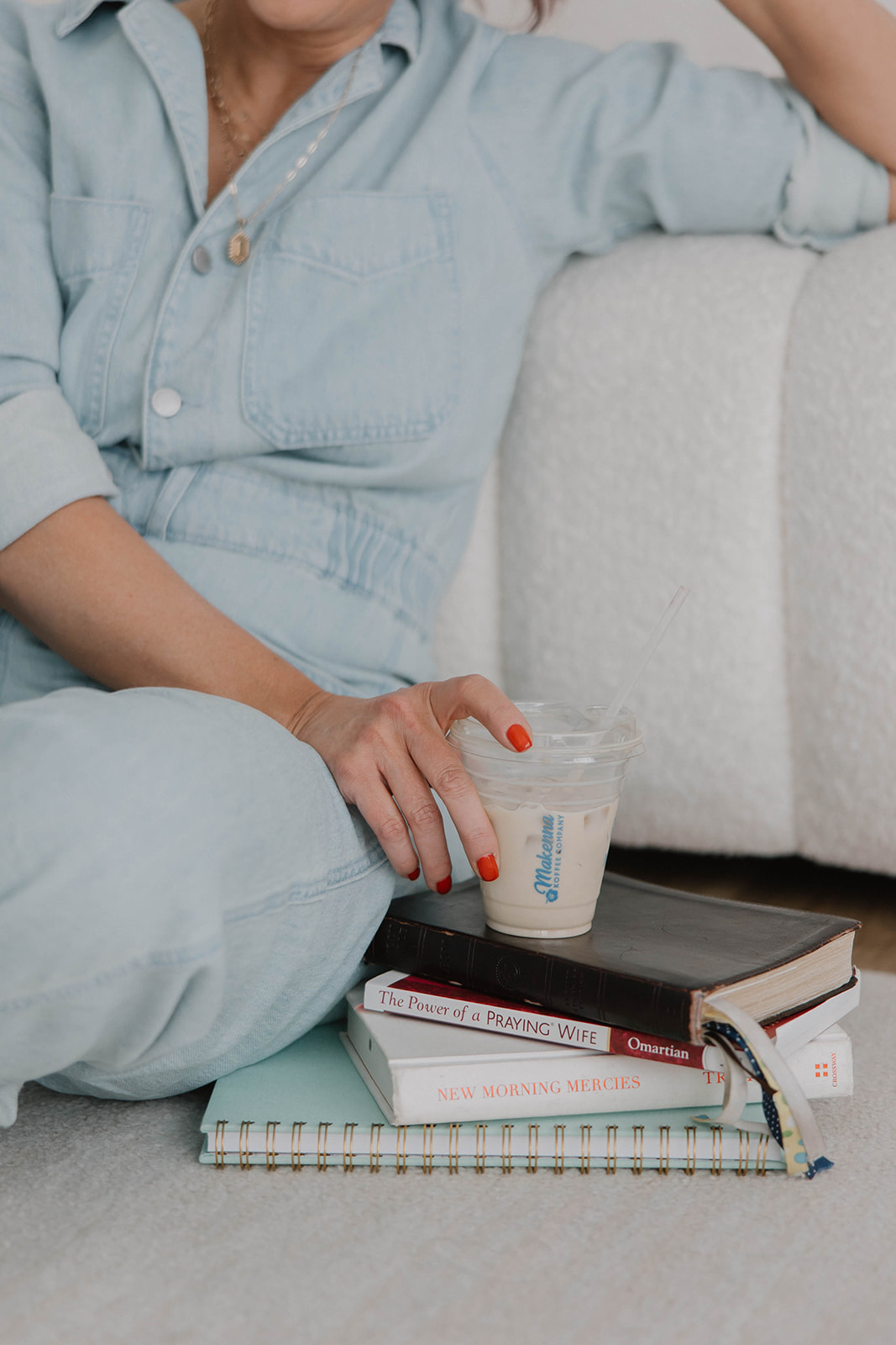 Michelle reading on floor