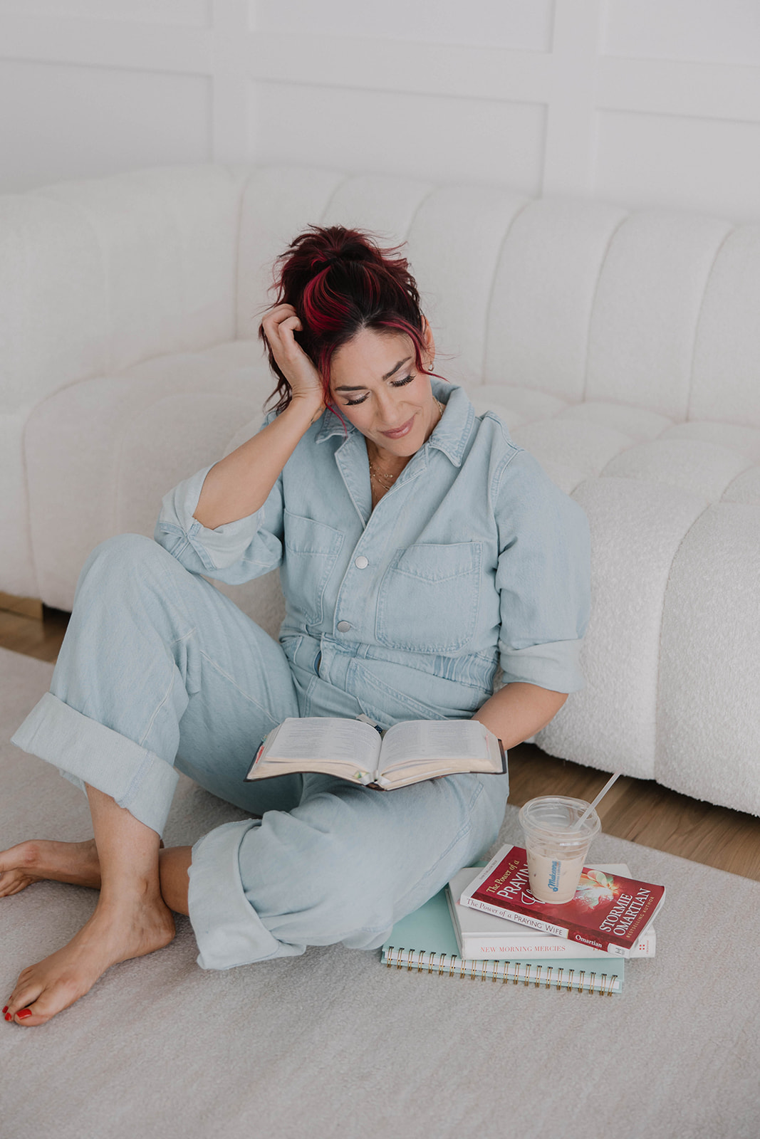 Michelle reading on sofa